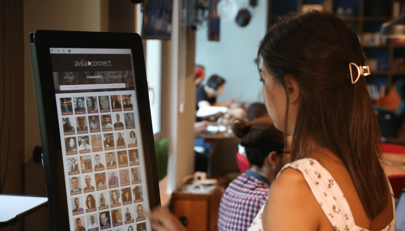 A girl using Avila Connect networking platform