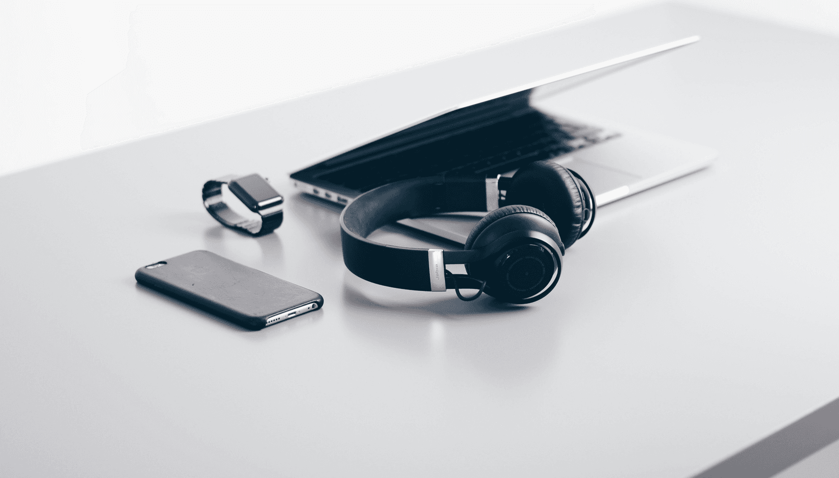 gadgets on the desk at a coworking space