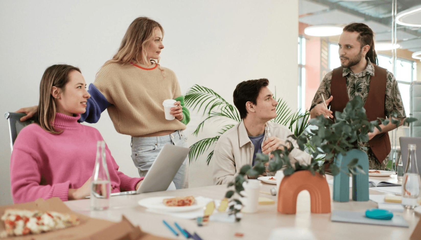 Coworking space members discussing something