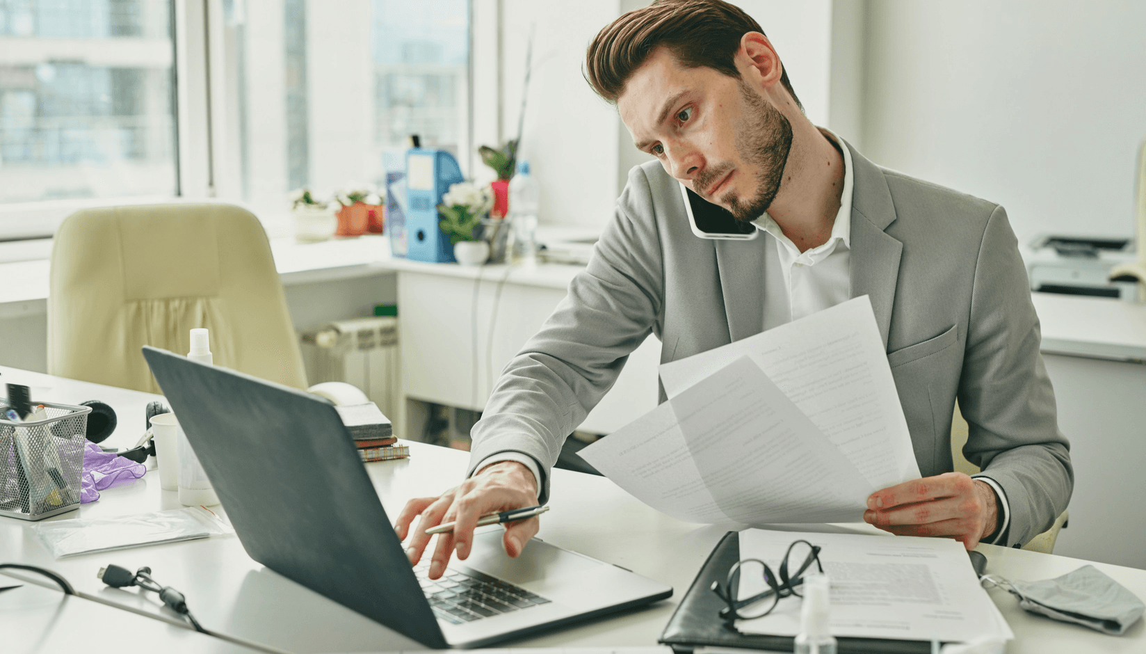 Notebook and a pen on the table at a coworking space
