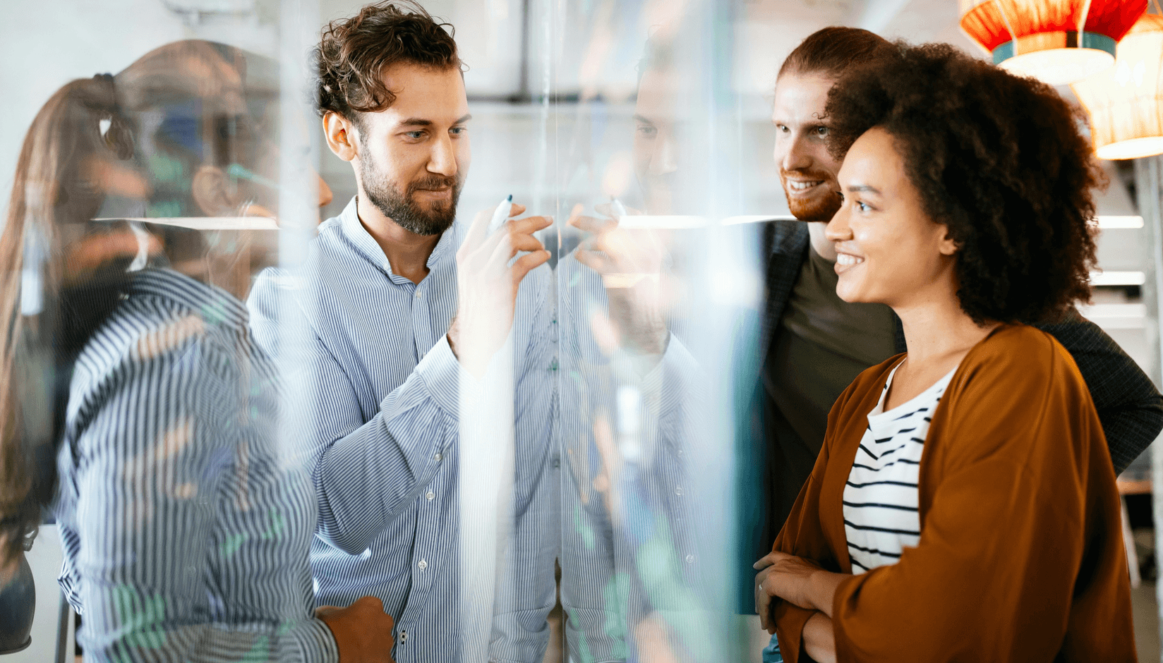 coworking space managers at the whiteboard