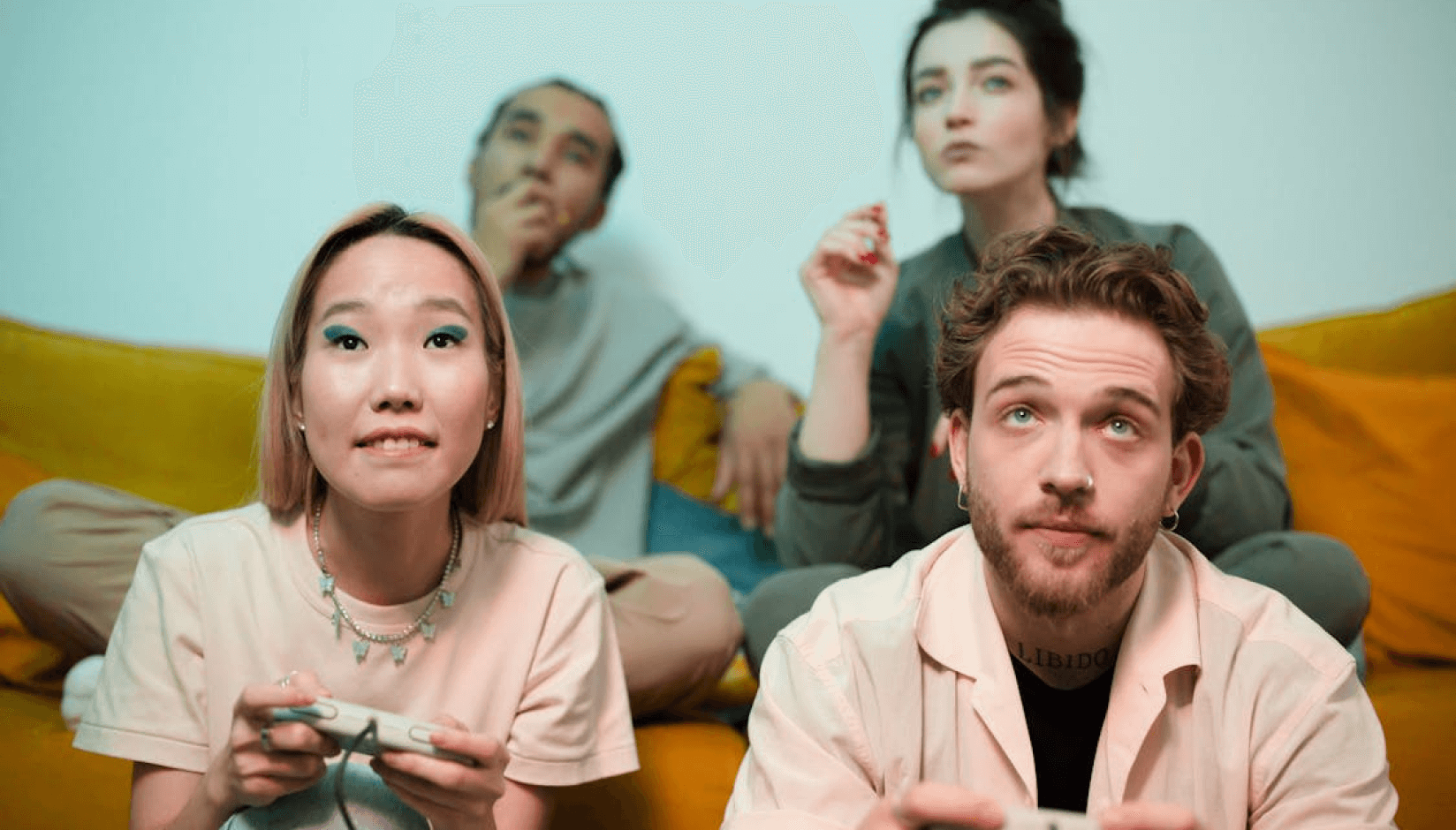 members playing video games at a coworking space