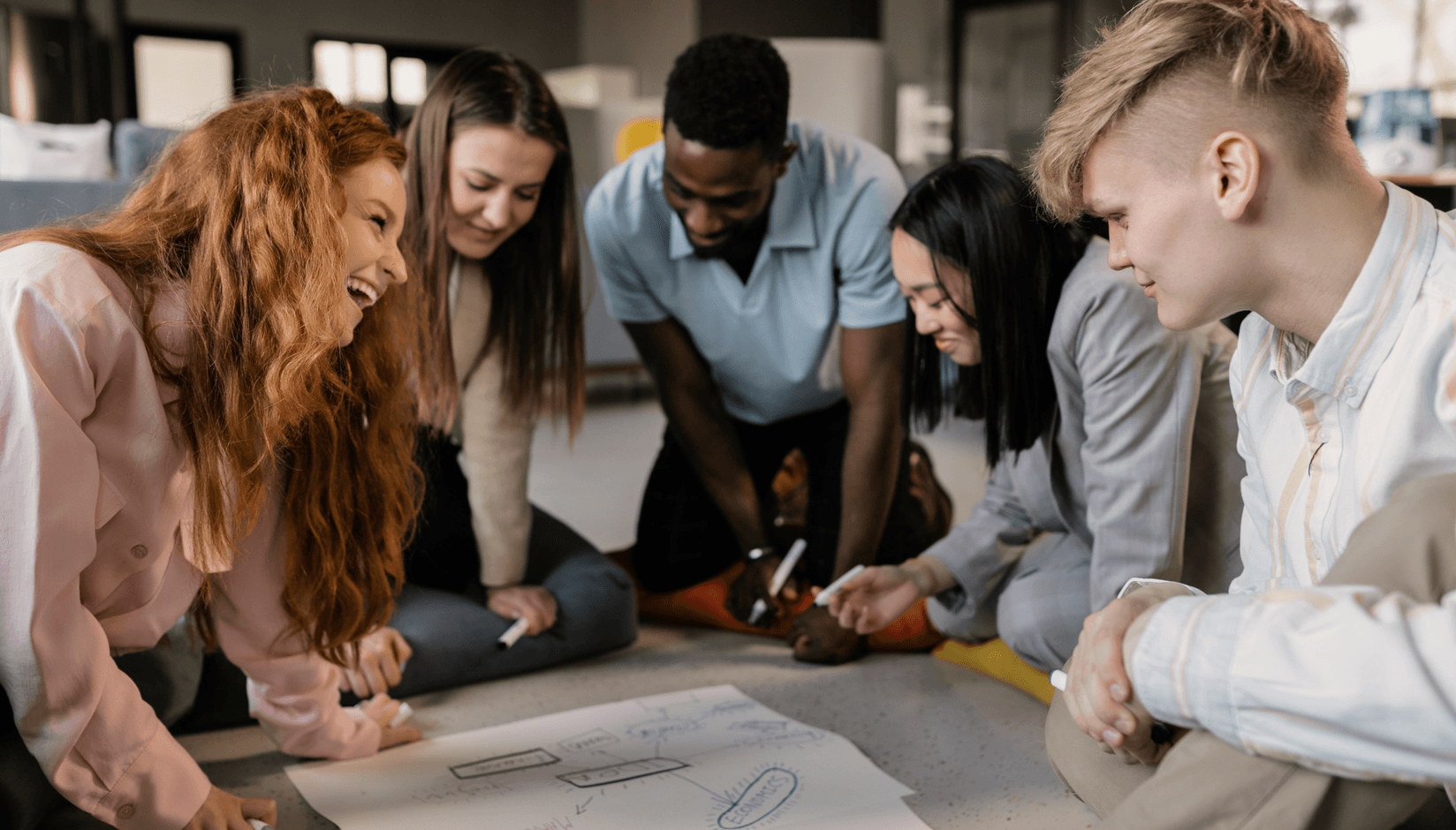 Coworking space team discussing recurring revenue model